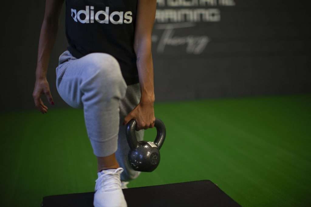 Female Client performing rehab physiotherapy exercise for the knee.